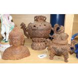 Two Chinese cast iron censers and a bust of Buddha, tallest 24cmCONDITION: All pieces badly rusted