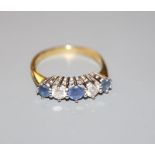 A sapphire and diamond five-stone half-hoop ring, 18ct gold setting, size O, gross weight 3.7