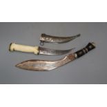 A kukri and an Eastern bone handled dagger