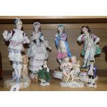 Two pairs of French porcelain figures and three other groups, tallest 33cmCONDITION: The larger