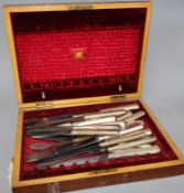 Twenty three Christofle silver plate handled knives, of various sizes