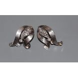 A modern pair of 18ct white metal and diamond set earclips, 29mm, gross 11.2 grams.CONDITION: