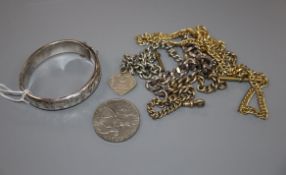 A modern silver identity bracelet, a modern silver bangle, three gilt alberts and a commemorative