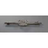 A mid 20th century white metal and diamond set coronet bar brooch, 56mm, gross 5 grams.CONDITION: