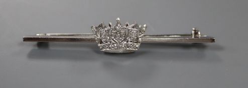 A mid 20th century white metal and diamond set coronet bar brooch, 56mm, gross 5 grams.CONDITION: