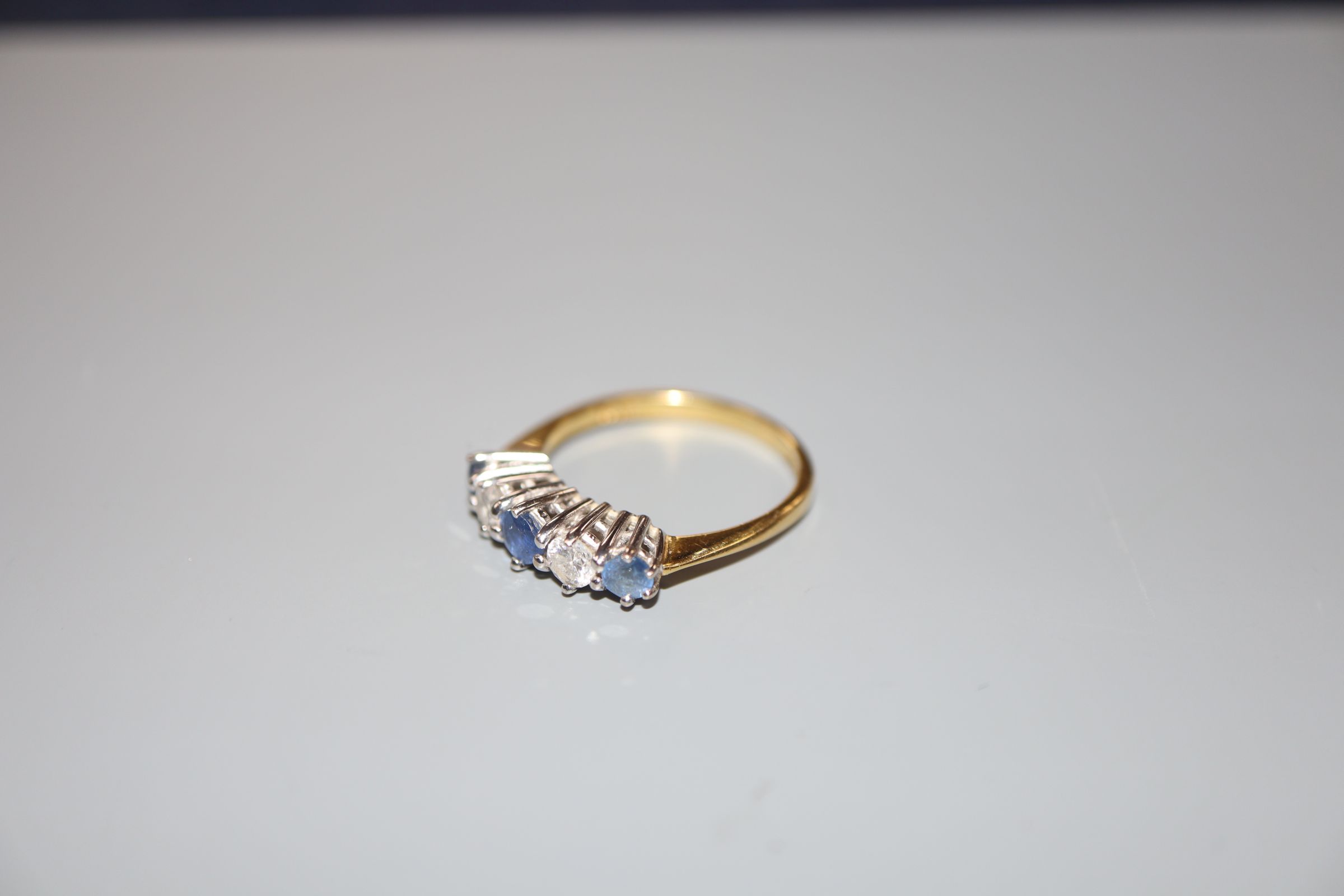 A sapphire and diamond five-stone half-hoop ring, 18ct gold setting, size O, gross weight 3.7 - Image 2 of 3