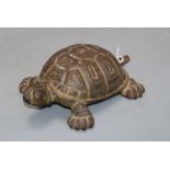 A cast iron tortoise, length 19.5cm