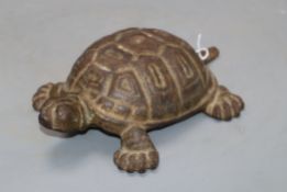 A cast iron tortoise, length 19.5cm