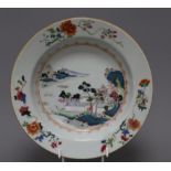 A Chinese export famille rose 'landscape' soup plate, Qianlong period, diameter 23cmCONDITION: The
