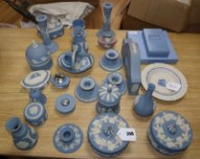 A collection of Wedgwood Jasperware decorative items, including a mantel clock, various boxes and