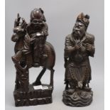 Two Chinese hardwood carvings of immortals, tallest 44cm