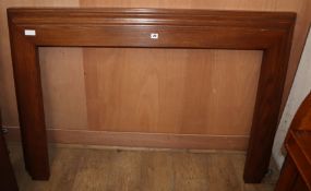 An Art Deco style oak fire surround, W.145cm H.96cm