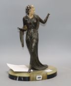 An Art Deco style resin and bronze figure, signed Menneville, overall height 41cm