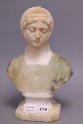 An alabaster bust of a lady, height 33cmCONDITION: Some discolouration and small chipping to foot.