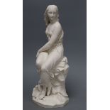A Minton parian figure of 'Miranda' by John Bell, semi-draped and seated with a large conch shell at