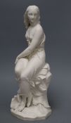 A Minton parian figure of 'Miranda' by John Bell, semi-draped and seated with a large conch shell at