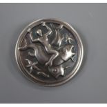 A post 1945 Georg Jensen 925 circular brooch, depiction merman with fish and starfish, design no.