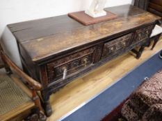 A 19th century carved oak dresser, W.184cm, D.57cm, H.76cm Condition report: The planked top is