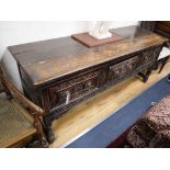 A 19th century carved oak dresser, W.184cm, D.57cm, H.76cm Condition report: The planked top is