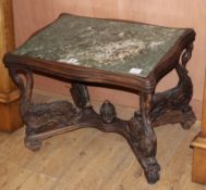 A carved oak marble top occasional table, on swan and dolphin supports, W.66cm D.48cm H.50cm