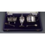 A cased modern Georgian style silver three piece condiment set and two spoons, Da-mar Silverware,
