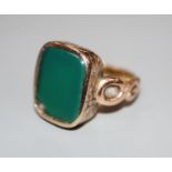 A 19th century yellow metal and chrysophase? set signet ring, size M, gross 7.2 grams.CONDITION: