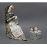 A Lladro figure of a lady sewing and a Nao group of kittens