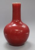A Chinese sang de boeuf bottle vase, height 34cmCONDITION: There is light crazing throughout as well