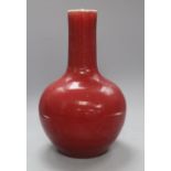 A Chinese sang de boeuf bottle vase, height 34cmCONDITION: There is light crazing throughout as well