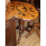 A 19th century Black Forest marquetry inlaid tripod table, W.74cm, D.54cm, H.75cm