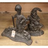 Two Victorian cast iron door stops - Highland soldier and Punch, larger 37cm