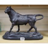 A bronze of a bull, on a marble base, signed A.L. Barye, height 27cm