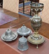 Three Indo-Persian tinned lidded dishes and a brass hu'qqa base table lamp, largest 43.5cm