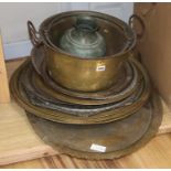 A quantity of Eastern metalware trays, etc.