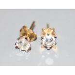 A pair of diamond and 18ct gold stud earrings, each stone approximately 0.22ct, gross weight 1.2