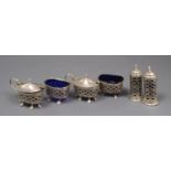 An Edwardian silver six piece condiment set, Birmingham, 1909.