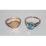 A 9ct gold signet ring(worn), 2.8 grams and a white metal and blue zircon(worn) dress ring, size