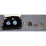 Three pairs of assorted white metal cufflinks.