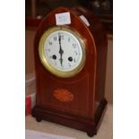 An early 20th century inlaid mahogany mantel clock