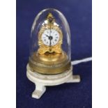 An Austrian miniature timepiece under a glass dome, overall height 5cm