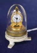 An Austrian miniature timepiece under a glass dome, overall height 5cm