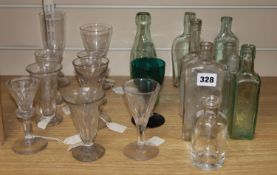 A quantity of glasses and glass bottlesCONDITION: The glasses appear good, although with some wear