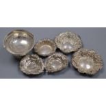 A George V silver pedestal bonbon basket, diameter 10.3cm and six other small silver dishes