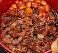 A single strand amber bead necklace, gross 53 grams and other necklaces including amber and