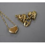 A modern Italian 375 heart shaped pendant necklace and a 9ct gold clasp, gross weight 4 grams.