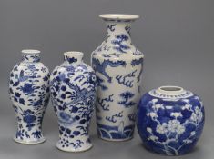 A Chinese blue and white 'dragon' vase, two blue and white vases and a jar, all c.1880-1910, tallest