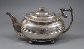 A George III engraved silver teapot, with engraved inscription, James McKay, Edinburgh, 1814,