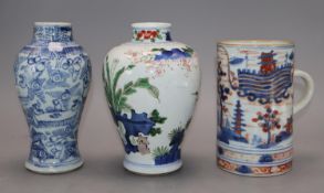 A Chinese famille verte wucai vase, a Chinese blue and white and an Imari mug, tallest