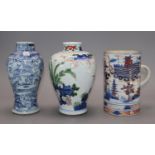 A Chinese famille verte wucai vase, a Chinese blue and white and an Imari mug, tallest