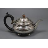 A George IV silver squat teapot by Pearce & Burrows, London, 1827, gross 12.5 oz.CONDITION: engraved